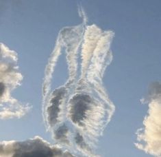 several jets are flying in the sky with clouds around them and one is leaving a trail