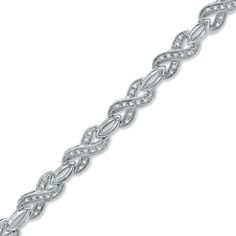 Representing the fierce attraction that brought you together, this exquisite bracelet pairs shimmering diamond-embellished "X" links with polished oval-shaped links. Buffed to a brilliant shine, this gorgeous 1/3 ct. t.w. diamond design measures 7.0 inches long and secures with a lobster claw clasp. Silver Diamond Oval Link Bracelet, Silver Diamond Bracelet With Oval Links, Silver Oval Link Diamond Bracelet, Silver Diamond Bracelet With Diamond Accents, Silver Diamond Bracelet With Oval Link And Diamond Accents, Silver Diamond Bracelet For Anniversary, Silver Oval Link Diamond Bracelet For Anniversary, Formal Infinity Diamond Bracelet, Infinity Diamond Bracelet For Formal Occasions