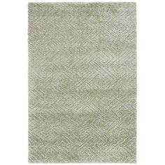 the rug is made from light green wool and has an uneven pattern on top of it