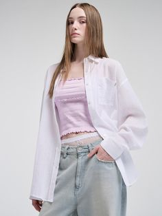 This product blends casual comfort with unique detailing, presenting an Oversized Pocket Summer Shirt that's both stylish and versatile. The relaxed fit offers a breezy option for warm days, while the large pocket detail adds a functional yet fashionable touch. Its oversized nature makes it a perfect layering piece or a standalone statement item. - Designed with an oversized fit for a relaxed and comfortable feel, ideal for the summer season.- Features a large front pocket that combines practicality with a stylish edge.- The shirt comes with a soft, breathable fabric that ensures comfort even on the hottest days.- Subtle branding elements give it a distinct identity without overpowering the simple elegance of the shirt. Oversized Relaxed Shirt With Pockets, Relaxed Fit Spring Tops With Pockets, Relaxed Fit Tops With Pockets For Spring, Spring Relaxed Fit Tops With Pockets, Spring Casual Tops With Pockets, Spring Tops With Pockets In Relaxed Fit, Daywear Tops With Pockets And Shirttail Hem, Spring Shirt With Pockets For Day Out, Casual Tops With Pockets And Shirttail Hem