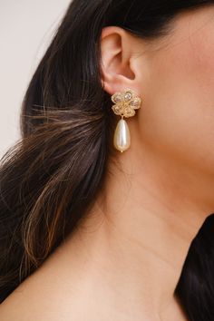 YASMINE // Statement gold bridal floral and pearl drop earrings - Beautiful statement flower wedding earrings. High quality 14k gold plated brass finish with a faux pearl and cubic zirconia stones.  Please note, that for hygiene reasons earrings cannot be returned. Delicate Gold Earrings For Bridal Shower, Glamorous Gold Pearl Earrings For Wedding, Glamorous Gold Plated Earrings For Weddings, Glamorous Gold Plated Wedding Earrings, Glamorous Flower Shaped Wedding Earrings, Glamorous Flower-shaped Wedding Earrings, Dainty Pearl Drop Flower Earrings For Wedding, Gold Flower Chandelier Earrings Elegant Style, Feminine Flower Earrings For Wedding