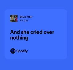 blue hair tv girl and she cried over nothing spotify logo on the screen