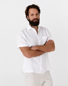 Classic shirt crafted from lightweight linen. With short sleeves, featuring cuffed hems, white river shell buttons, one chest pocket, and side vents for added style. • Regular fit • Shirt style collar • Buttoned • Short sleeves Classic Short Sleeve Shirt For Beach, White Shirt With Rolled Sleeves And Spread Collar, Collared Linen Short Sleeve Shirt For Beach, Casual White Linen Short Sleeve Shirt, White Short Sleeve Shirt With Spread Collar For Vacation, White Short Sleeve Vacation Shirt With Spread Collar, Classic White Linen Short Sleeve Shirt, White Unstructured Short Sleeve Shirt For Summer, Unstructured White Short Sleeve Shirt For Summer