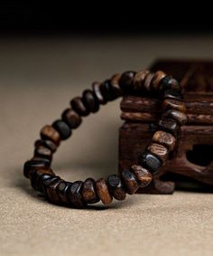 The exquisite Retro Brown Sandalwood Buddha Beads Bracelet is a true work of art, exuding an air of sophistication and exclusivity. Handcrafted with precision and attention to detail, this bracelet boasts a timeless appeal that is reminiscent of old-world luxury. The warm hues of brown sandalwood perfectly complement the intricate Buddha beads, making it a must-have accessory for the discerning fashion connoisseur. Elevate your style with this exquisite bracelet and embrace the elegance it exude