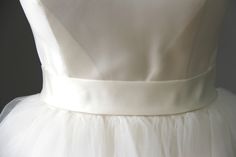 Stylish and elegant bridal sash made of Royal satin fabric. The sash can be customized at request and can be made of Royal satin fabric, Satin ribbon, Velvet ribbon, Embroidered ribbon and Organza ribbon. We also offer various colors, width and length. For more wedding sashes and belts, please access https://www.etsy.com/shop/LidiasBoutiqueDesign?ref=seller-platform-mcnav&section_id=23425051. We also recommend our hair bridal accessories https://www.etsy.com/shop/LidiasBoutiqueDesign?ref=sel Elegant Bridal Belt With Satin Bow For Bridesmaid, Wedding Bridal Belt With Sashes In Satin, Elegant White Bride Sashes, White Bridal Belt With Ribbon For Wedding, White Satin Bridal Belt With Sashes, Elegant Cream Sashes For Bridesmaid, Satin Bridal Belt With Ribbon For Wedding, Fitted Bridal Belt With Ribbon For Wedding, White Bridal Sash Belt For Bridesmaid