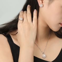 Style: Female Material: S925 Sterling Silver, Bread Pearl Pearl Type: Uncultured Pearl Color: White & Pink Pendant Size: 21*14mm Earring Size: 12.3*12.3mm Ring Size: Adjustable