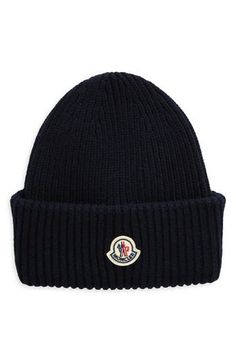 Moncler's cockerel logo brands the cuffed brim of a ribbed beanie knit from a sumptuous blend of virgin wool and cashmere. 70% virgin wool, 30% cashmere Dry clean Made in Italy Designer Beanie For Winter, Winter Wool Hats With Embroidered Logo, Classic Beanie With Embroidered Logo, Moncler Logo, Logo Branding, Cashmere, Dry Clean, Navy Blue, Nordstrom