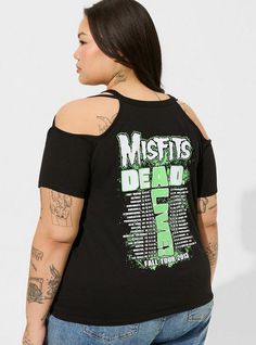 FIT Classic fit: Fitted up top, eased through the body. Measures 24” from shoulder (size 2). MATERIALS + CARE Cotton-blend knit fabric. . 60% cotton, 40% polyester. . Machine wash cold. Tumble dry low. Imported. DETAILS Crew neckline. . Short sleeves. Misfits graphic print. The best plus size women's misfits classic fit cotton o-ring cold shoulder tee graphic tees in deep black made of cotton/polyester. Rock your look from Torrid to Festivals like Coachella and Lollapalooza, a concert, a show, o Chic Winter Style, Fitted Wedding Dress, O Ring, Cold Shoulder, Winter Fashion, Cotton Blend, Short Sleeves, One Piece, Plus Size