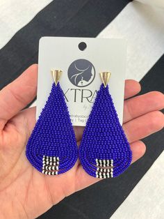 "These fun, colorful, seed bead dangle earrings feature gorgeous cobalt blue seeds with a black and white patterned accent on the bottom fringe. They are made with size 11 miyuki seed beads. The closure is a gold plated stainless steel post with safety back. They hang approximately 3.0 inches from the lobe and measure 1.5\" inches across their widest point.  Each pair is made to order and handmade. Each earring takes several hours to complete as each bead is stitched together, one by one, using Blue Beaded Drop Earrings With Large Beads, Blue Large Beads Drop Earrings, Blue Large Beaded Drop Earrings, Blue Dangle Jewelry With Black Beads, Blue Dangle Earrings With Black Beads, Blue Beaded Teardrop Chandelier Earrings, Blue Beaded Teardrop Earrings For Gift, Bohemian Beaded Blue Teardrop Earrings, Blue Beaded Long Drop Jewelry