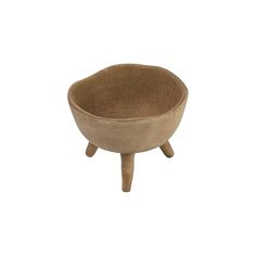 a brown bowl sitting on top of a wooden stand