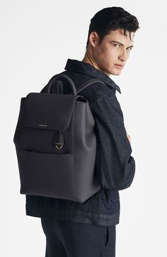 A chic and ultra-spacious office companion to refine your work-from-anywhere style. The Large Soft Backpack, handcrafted entirely from full-grain European leather, reimagines The Mini Soft Backpack with enhanced storage capability and increased all-day comfort. Featuring magnetic closure, a padded laptop sleeve to secure devices up to 16" and priority and zipped pockets to house valuables, the elegant carryall caters to every professional need. Crafted entirely from full grain sustainable DriTan Versatile Backpack With Detachable Strap For Work, Modern Workwear Backpack With Removable Pouch, Modern Workwear Backpack With Adjustable Strap, Designer Business Backpack With Removable Pouch, Luxury Workwear Backpack With Detachable Strap, Modern Leather Backpack For Work With Adjustable Strap, Modern Leather Backpack With Adjustable Strap For Work, Leather Backpack With Removable Pouch For Work, Modern Office Backpack With Luggage Sleeve