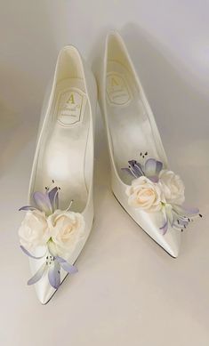 Simply Beautiful Hand Finished Flower Embellished Ivory and Lilac Lavender Satin Bridal Shoes Satin Bridal Shoes Beautifully Hand Finished with Soft Cream and Lilac Flowers   Very Elegant Perfect Wedding Day Shoe High for Elegance Perfect for Comfort Sizes: UK 3-8 (EU 36-43) Lavender Heels Wedding, Silk Floral Shoes, Lilac Wedding Shoes, Light Purple Wedding Heels, White Formal Wedding Shoes With Flower Design, White Flower Wedding Shoes, Elegant Slip-on Wedding Shoes With Handwork, Lilac Lavender, Womens Pumps