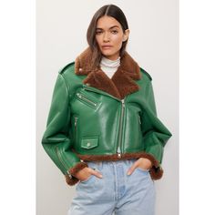 Green faux leather (70% Polyurethane, 30% Polyester/100% Polyester). Jacket. Long sleeves. Collar. Front zipper closure. 20" from shoulder to hemline. Imported. Trendy Leather Jacket With Padded Collar For Fall, Spring Leather Jacket With Faux Fur Trim, Spring Workwear Leather Jacket With Faux Fur Trim, Faux Leather Jacket With Faux Fur Trim For Fall, Fall Faux Leather Jacket With Faux Fur Trim, Fall Leather Biker Jacket With Faux Fur Lining, Green Winter Biker Jacket With Zipper, Green Winter Biker Jacket With Zipper Closure, Winter Green Biker Jacket With Zipper Closure