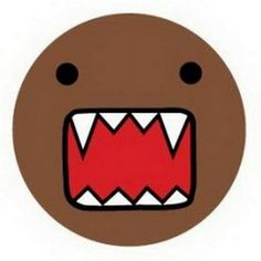 a brown face with red teeth and big fangs on it's mouth is shown