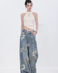 Cute denim pants with a floral design that attracts attention.

This piece is a well-balanced mix of casual and girly elements.

The thick wide silhouette does not emphasize the line of your legs and makes it easy to maintain balance.
◾️Model
Height/Weight：163cm(64.1in)/44kg(97.0lb)
Fitting Size：S





Cm
(inches)

Length
Waist
Hip


S
104(40.9)
62(24.4)
104(40.9)


M
106(41.7)
66(25.9)
108(42.5)


L
108(42.5)
70(27.5)
112(44.0)


XL
110(43.3)
74(29.1)
116(45.6) Casual Floral Print Wide Leg Pants For Spring, Casual Floral Print Cotton Wide Leg Pants, Spring Jeans With Five Pockets, Spring Floral Print High Waist Wide Leg Pants, Baggy Jeans For Spring, Spring Floral Print Straight Leg Bottoms, Casual Denim Bottoms With Floral Print, Baggy Floral Print Bottoms For Spring, Floral Print Wide Leg Denim Bottoms