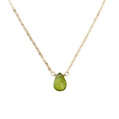 The dainty peridot necklace is perfect for anyone with an August birthday. Peridot has been prized throughout history for its protective powers and the ability to help one recognize their own destiny and purpose. These gemstones are an olive-green color, and crafted with care onto your choice of 14k gold, gold fill or sterling silver chain.DETAILS- Genuine Peridot- Peridot size: approximately 9 mm by 6 mm- Made in gold filled, sterling silver or 14k solid gold- Adjustable chain 14" - 16", 16" - Green Peridot Necklace For May Birthstone, Lime Green Peridot Necklace For May Birthstone, Lime Green Peridot Jewelry For May Birthstone, Green Peridot Pendant Necklace, Peridot Faceted Jewelry For May Birthstone, Peridot Gemstone Pendant Necklace, Faceted Peridot Jewelry For May Birthstone, Peridot Gemstone Necklace For May Birthstone, Green Peridot Gemstone Necklace