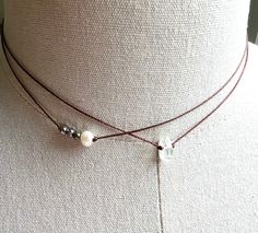 "Simple and chic. Perfect for everyday and goes with everything. Features antique silver glass beads, freshwater pearl, tumbled clear glass, brown nylon cord. The necklace is 14\";with a 2\" extension. Message me if you would like a different length or to remove the extension. The necklace will be gift boxed." Diy Jewlry, Plush Craft, Layered Beaded Necklaces, String Necklace, Necklace Outfit, Necklace Layered, Layered Chokers, Boho Choker, Rock Jewelry