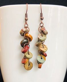 Picasso Jasper Copper Earrings - Boho Style earrings in earthy tones. Each pair is made individually, and each bead is unique! All pairs are different and may appear different than photo. Enjoy the true uniqueness of these beautiful Picasso Jasper Earrings! Artisan Brown Beaded Earrings For Pierced Ears, Brown Adjustable Earrings With Natural Stones, Artisan Brown Earrings With Natural Stones, Earthy Drop Earrings With Natural Stones, Adjustable Earthy Dangle Earrings, Earthy Natural Stone Drop Earrings, Brown Wire Wrapped Drop Earrings, Brown Wire Wrapped Drop Beaded Earrings, Brown Wire Wrapped Dangle Earrings