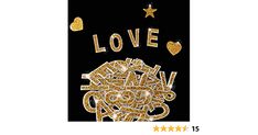 a black background with gold glitter letters and stars in the shape of words that spell out love