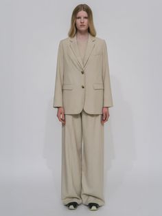 Crafted of Pre-Fall 24’s Lightweight Canvas Suiting, a Japanese fabric with an airy feel, Rosetta Getty's Relaxed Pull-On Pant has an inherently casual quality with an elasticized pull-on silhouette. Semi-tailored, the style has a flattering wide-leg shape with a flowing fit that can easily be dressed up or down. Crisp and light, the Lightweight Canvas Suiting is a Japanese fabric that is ideal for tailoring. Classic but fresh, it offers a new perspective on foundational wardrobing. Elasticized waistband Side-seam pockets Wide leg Pulls on 77% Polyester, 16% Rayon, 7% Linen Travel Blazer, Rosetta Getty, Fall 24, Denim T Shirt, Tailored Blazer, Cropped Flares, Japanese Fabric, New Perspective, Pull On Pants