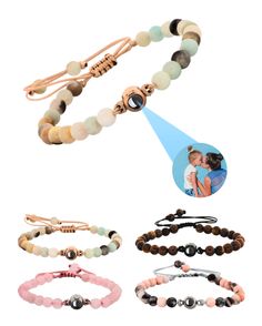 PRICES MAY VARY. ✅ 𝐏𝐄𝐑𝐒𝐎𝐍𝐀𝐋𝐈𝐙𝐄𝐃 𝐂𝐇𝐀𝐑𝐌: Elevate your style with our unique bracelet, offering a one-of-a-kind photo pendant. Tailored to celebrate moments, this piece marries fashion with heartfelt memories, becoming more than just an accessory but a treasure. ✅ 𝐕𝐈𝐁𝐑𝐀𝐍𝐓 𝐕𝐀𝐑𝐈𝐄𝐓𝐘: Dive into a world of 60 exclusive combinations! Mix and match from six rope hues, three projection stones, and five color options to craft a bracelet that's as unique as you. Flaunt your per Bracelet With Picture Inside, Bracelet With Picture, Memory Bracelets, Bracelet For Couples, Photo Projection Bracelet, Picture Bracelet, Memory Bracelet, Circle Photo, Memory Projects