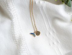 Get ready to make a splash with this charming dainty whale tail necklace featuring a personalized initial charm. Perfect for any occasion, whether it's treating yourself or spoiling someone special! * How To Order 1. Choose the size. 2. Select initials, if you do not want any initial, select "NONE" (UPPER CASE and HEART Shape Available) if you want LOWERCASE please message me BEFORE placing the order!) 3. Add to cart and submit order :) * Charm: Brass Pendants, with Resin, Whale tail * Charm Siz Whale Tale, Whale Tail Necklace, Big Whale, Brass Pendants, Whale Tail, Minimalist Gifts, Necklace Minimalist, Upper Case, Necklace Personalized