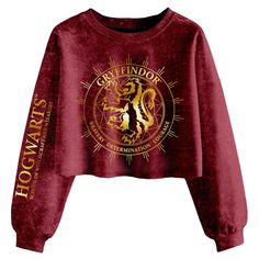 a red crop top with gold lettering on the front and side, that says gryffindor