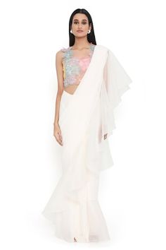 Off white plain pre-draped ruffle saree. Paired with a floral applique work blouse. - Aza Fashions White Pre-draped Saree With Ruffles In Traditional Drape, Fitted Draped White Blouse, Fitted White Draped Blouse, White Draped Fitted Blouse, White Fitted Draped Blouse, Off White Saree, Applique Blouse, Ruffle Sarees, Payal Singhal