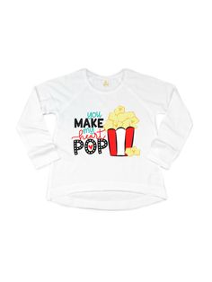 Girls Valentine's Day Shirt Pop, pop, hooray! Our Girls Valentine's Day Shirt is here to add a dash of fun to the celebration. With an adorable 'You Make my Heart Pop' design, this shirt is popping with love and style. A playful choice for your little popcorn lover! 🍿💖 Details 100% cotton white; short + long sleeve lengths unisex, kids fit heat transfer apparel decorating method made in Philadelphia, PA by a certified woman-owned, black-owned, small business Processing Time Orders are processe White Pop Culture Slogan Tops, White Pop Culture Tops With Slogan, White Pop Culture Slogan Top, Cute Graphic Print Top For Birthdays, Playful Crew Neck Top For End Of School Year, Fun Long Sleeve Tops For Birthday, Pop Culture Birthday Tops With Letter Print, Fun Long Sleeve Slogan T-shirt, Fun Long Sleeve Slogan Tops