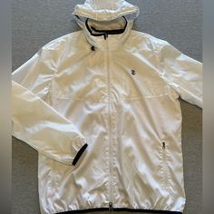 In Perfect New Condition, Hood Rolls Up Into Collar,Size Large. Length From Under Arm 18”, Chest 24 1/2”, Sleeve Length From Seam 27” 100% Of This And Every Sale From This Closet Benefits Non Profit Animal Sanctuaries And Rescues Animal Sanctuary, Non Profit, Rain Jacket, Mens Jackets, White And Black, Rolls, Jackets & Coats, Golf, Benefits