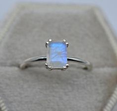 Statement Moonstone Ring ~ 925 Sterling Silver Ring ~ Size- 6x8 mm ~  Birthstone Ring ~ Rectangle Ring ~ Emerald Cut Ring ~ Mother's Day Gift This Sterling Silver Gemstone Ring is perfect as a gift item, for you and especially your loved ones. We Also Accept Wholesale Or Orders And All Kinds Jewelry & Gemstones Re Available In Small And Bulk Quantity. For Any Query Please Contact Us. * All our jewelry is Micron Plated which is higher quality as compared to Standard Plating * Please note that there will be slight variations in stone texture and color shades in the actual product that you receive. Stone quality or grade will be same. Product Info  Gemstone -- Rainbow Moonstone  Size -- 6x8 MM. Metal -- 925 Sterling Silver Style -- Minimalist Manufacturer In -- India  Stone Color -- Multi & R Emerald Cut Rings, Stone Texture, Style Minimalist, Moonstone Ring, Birthstone Ring, 925 Sterling Silver Ring, Moonstone, Silver Fashion, Gemstone Jewelry