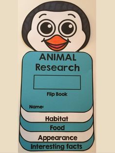 an animal research flip book with penguin on it