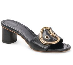 A sophisticated slide with a playful side, these must-have mules add a modern touch to your summery fashion statements thanks to a mid-height block heel and bold buckle detail. From Dolce Vita. Office Sandals With Buckle Closure For Summer, Chic Open Toe Mules With Tang Buckle, Trendy High Heel Mules With Buckle Closure, Modern High Heel Mules With Buckle Closure, Summer Square Toe Mules With Buckle Closure, Modern Mules With Buckle Closure And High Heel, Party Mules With Buckle Closure And Square Toe, Chic Office Sandals With Buckle Closure, Chic Summer Mules With Tang Buckle