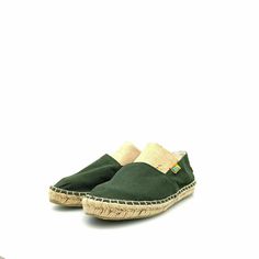 Step into comfort and style with the Ubuntu Womens Canvas Slip-On Shoes in a vibrant green hue. Perfectly designed for the modern woman, these shoes blend practicality with a chic aesthetic, making them an essential addition to your casual wardrobe. The soft canvas material not only feels great against your skin but also offers breathability, ensuring your feet stay cool and comfortable all day long. With their effortless slip-on design, you can easily transition from a morning coffee run to an Modern Green Sneakers With Textured Sole, Green Slip-ons With Rubber Sole For Summer, Green Canvas Sneakers With Cushioned Footbed, Casual Green Closed Toe Slip-ons, Green Flat Heel Slip-ons For Spring, Green Rubber Sole Sneakers For Spring, Spring Green Sneakers With Rubber Sole, Green Flat Sneakers For Summer, Green Sneakers With Rubber Sole For Spring