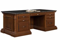 an office desk with granite top and drawers