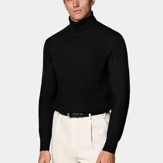 This black turtleneck sweater is tailored to a slim fit and features a ribbed texture, raglan long sleeves, and a ribbed hem and cuffs. Black Turtleneck Sweater With Ribbed Cuffs, Wool Turtleneck With Ribbed Collar And Long Sleeves, Modern Winter Sweater With Ribbed Neckline, Modern Ribbed Sweater For Work, Modern Ribbed Sweater For Workwear, Modern Black Sweater With Ribbed Collar, Funnel Neck Sweater With Ribbed Cuffs For Work, Classic Turtleneck Sweater With Ribbed Collar, Classic Black Turtleneck