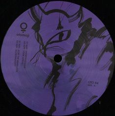 a purple label with black writing on the front and side of it, that reads o'onoi