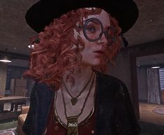 a woman with red hair wearing glasses and a black hat in a room filled with furniture