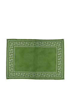 a green rug with white greek border