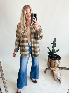 Y'all are going to love the Marcie Shirt features a relaxed, oversized fit with extended shoulders and a button-down front. The collared neckline and long sleeves are complemented by button cuffs, all made from 100% polyester with a classic olive plaid print. Madalynn is 5'7" and wearing her Normal Size Med S 2/4, M6/8, L10/12 Authentic Turquoise Jewelry, Mini Accessories, Wild Rag, Plaid Print, Turquoise Jewelry, Oversized Fits, Shopping Outfit, Dress Outfits, Long Sleeves