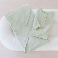 **Please Read Full Item Description & FAQ Page Before Ordering** This is a discounted Bundle of our Moses Pod , knotted gown, and swaddle. Moses Pod The lounger is to be used for daytime supervised lounging in your bassinet. When baby is unattended or during overnight sleep, only the provided flat firm pad should be used in the bassinet. Fits perfectly in bassinets from 29"L x 16"W to 33"L x 19"W Works with our Bilia Bassinet, Nap & Pack Bassinet, Ark Bassinet, & Malaika Bassinet 100 Sleep Essentials, Sleeping Gown, Newborn Essentials, Nursing Cover, Tummy Time, Organic Fabrics, Pad Cover, Baby Sleep, Terry Cloth