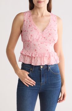 This sleeveless top in an easy, flattering fit is an excellent addition to your chill-time wardrobe. 19" length Ties at back V-neck Sleeveless 100% polyester Hand wash, line dry Imported Fitted V-neck Tank Top For Spring, Fitted V-neck Floral Print Tank Top, Chic Floral Print V-neck Tank Top, Pink Floral Print V-neck Tank Top, Fitted Floral Print V-neck Tank Top, Chic V-neck Floral Print Tank Top, Fitted V-neck Tank Top With Floral Print, V-neck Tank Top For Spring Day Out, Floral Print V-neck Camisole