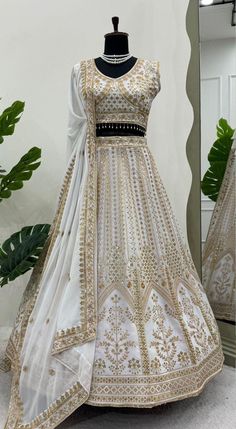 Embroidered White Lehenga Choli For Women Dupatta Set Party Wear Pakistani Dress Ghagra Choli Traditional Bridesmaid Dress Saree Blouse Lehenga Details Fabric: Faux Georgette Work: Intricate thread embroidery with sequins Size: Fits up to 44 inches (semi-stitched) Inner Lining: Soft Micro Fabric Flair: Enhanced with cancan and canvas for added volume Choli (Blouse) Fabric: Faux Georgette Inner Lining: Soft Micro Fabric Work: Thread embroidery with sequins and Moti lace border Size: Unstitched, f White Wedding Lehenga, Moti Lace, Bridal Lehenga Indian, White Lehenga Choli, Embroidery Dress Pattern, Lehenga Choli For Women, Saree Blouses Online, Choli For Women, White Lehenga