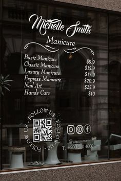 there is a sign in the window that says machine suite manicure and other items are on display