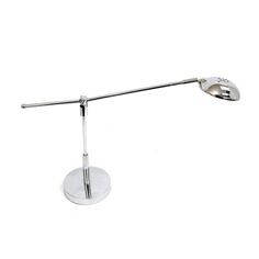 an adjustable table lamp on a white background with clippings to the side and one arm pointing upward