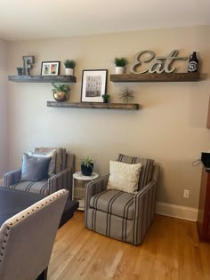 the living room is clean and ready for guests to use it as a dining area