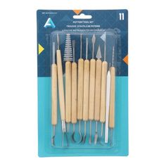 six wooden handled kitchen utensils in plastic packaging