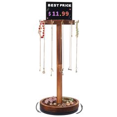 a wooden jewelry stand with a price sign on the top and several necklaces hanging from it