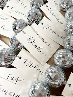 disco ball place cards with name tags on them