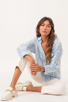 image of a female model wearing a LOLA OVERSIZED SHIRT BLUE STREAK DEAR JOHN DENIM Blue Relaxed Fit Blouse With Cuffed Sleeves, Blue Long Sleeve Shirt With Rolled Sleeves, Blue Blouse With Relaxed Fit And Cuffed Sleeves, Blue Blouse With Cuffed Sleeves Relaxed Fit, Blue Blouse With Cuffed Sleeves And Relaxed Fit, Oversized Blue Shirt With Rolled Sleeves, Blue Shirt With Cuffed Sleeves For Spring, Spring Blue Shirt With Striped Cuffs, Blue Shirt With Striped Cuffs For Spring